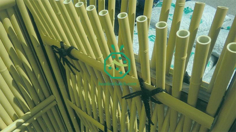 Overlapping synthetic garden bamboo stick fence